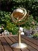 Brass lecture gyroscope on table